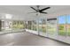 Spacious screened porch overlooking the golf course at 13229 Golf Ridge Pl, Hudson, FL 34669