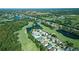 Wide aerial view of home and neighborhood at 15618 Shoal Creek Pl, Odessa, FL 33556