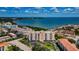 Aerial view of condo building near waterfront at 19029 Us Highway 19 N # 9-706, Clearwater, FL 33764