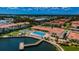Aerial view of community with pool and waterfront access at 19029 Us Highway 19 N # 9-706, Clearwater, FL 33764