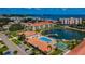 Aerial view of waterfront community with pool and dock at 19029 Us Highway 19 N # 9-706, Clearwater, FL 33764