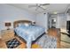 Spacious bedroom with large bed and wood flooring at 19029 Us Highway 19 N # 9-706, Clearwater, FL 33764