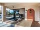 Condo building entrance with glass doors and security features at 19029 Us Highway 19 N # 9-706, Clearwater, FL 33764
