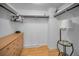 Walk-in closet with ample shelving and dresser at 19029 Us Highway 19 N # 9-706, Clearwater, FL 33764