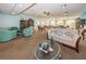 Spacious common area with seating, library, and large windows at 19029 Us Highway 19 N # 9-706, Clearwater, FL 33764