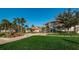 Community building with landscaping and flag at 19029 Us Highway 19 N # 9-706, Clearwater, FL 33764