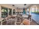 Relaxing community room with tables and chairs at 19029 Us Highway 19 N # 9-706, Clearwater, FL 33764