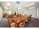Large community room with multiple tables and chairs at 19029 Us Highway 19 N # 9-706, Clearwater, FL 33764