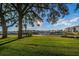Landscaped grounds with waterfront and community buildings at 19029 Us Highway 19 N # 9-706, Clearwater, FL 33764