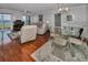 Dining room with hardwood floors and glass table at 19029 Us Highway 19 N # 9-706, Clearwater, FL 33764