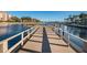 Wooden community dock offering scenic waterfront views at 19029 Us Highway 19 N # 9-706, Clearwater, FL 33764