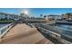 Community dock with benches overlooking the water at 19029 Us Highway 19 N # 9-706, Clearwater, FL 33764