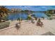 Waterfront patio with seating and stunning lake views at 19029 Us Highway 19 N # 9-706, Clearwater, FL 33764