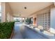 Covered condo entrance with landscaping at 19029 Us Highway 19 N # 9-706, Clearwater, FL 33764