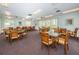Game room with multiple tables for games at 19029 Us Highway 19 N # 9-706, Clearwater, FL 33764