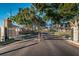 Gated entrance to the community with landscaping at 19029 Us Highway 19 N # 9-706, Clearwater, FL 33764