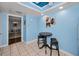 Small kitchen area with breakfast nook and light blue walls at 19029 Us Highway 19 N # 9-706, Clearwater, FL 33764