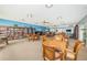 Well-lit library with ample bookshelves and seating at 19029 Us Highway 19 N # 9-706, Clearwater, FL 33764