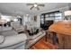 Living room with hardwood floors and comfortable seating at 19029 Us Highway 19 N # 9-706, Clearwater, FL 33764
