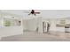 Open concept living room and kitchen area at 30619 White Bird Ave, Wesley Chapel, FL 33543