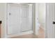 Bathroom featuring a shower stall with glass enclosure at 30619 White Bird Ave, Wesley Chapel, FL 33543