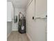 Spacious basement includes water heater, white cabinets and newly finished flooring at 3414 Lindsey St, Dover, FL 33527