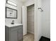 Bright bathroom with shower, closet and modern vanity at 3414 Lindsey St, Dover, FL 33527