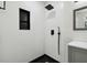 Modern shower with black hardware and bright white tiling at 3414 Lindsey St, Dover, FL 33527