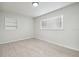Bright bedroom features a window, built-in shelf and light wood-look flooring at 3414 Lindsey St, Dover, FL 33527
