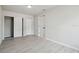 Light filled bedroom with new floors and access to the closet at 3414 Lindsey St, Dover, FL 33527