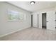 Bright bedroom with new floors, a closet and a bright, sunny window at 3414 Lindsey St, Dover, FL 33527