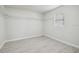 Bedroom with a window and wire closet racks at 3414 Lindsey St, Dover, FL 33527