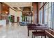 Elegant lobby with a grand piano, comfortable seating, and large windows at 345 Bayshore Blvd # 808, Tampa, FL 33606
