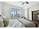 Bedroom with large window, city view and ceiling fan at 345 Bayshore Blvd # 808, Tampa, FL 33606
