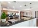 Modern kitchen with stainless steel appliances and dark granite countertops at 345 Bayshore Blvd # 808, Tampa, FL 33606