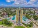 Aerial view of a luxury high-rise building with ample parking and city views at 345 Bayshore Blvd # 808, Tampa, FL 33606
