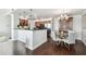 Open concept kitchen with island, stainless steel appliances, and hardwood floors at 345 Bayshore Blvd # 808, Tampa, FL 33606