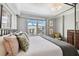 Bright bedroom featuring a large bed and city views at 345 Bayshore Blvd # 808, Tampa, FL 33606