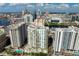 Stunning aerial view showcases luxury condos with downtown city skyline in the distance at 450 Knights Run Ave # 407, Tampa, FL 33602
