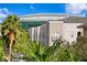 Picturesque view of Amalie Arena, visible from this building and surrounded by vibrant greenery and palm trees at 450 Knights Run Ave # 407, Tampa, FL 33602