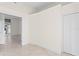 Empty bedroom with tiled floor, and white closet doors at 450 Knights Run Ave # 407, Tampa, FL 33602