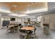 Large clubhouse boasts tables, chairs, and pool table for residents' enjoyment and entertainment at 450 Knights Run Ave # 407, Tampa, FL 33602