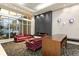 Stylish common area with fireplace, seating, and modern decor at 450 Knights Run Ave # 407, Tampa, FL 33602