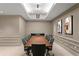 Functional conference room with a large table and modern decor perfect for meetings at 450 Knights Run Ave # 407, Tampa, FL 33602