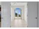 View of the dining area with double doors and tiled floor at 450 Knights Run Ave # 407, Tampa, FL 33602