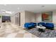 Welcoming building lobby area with stylish furnishings and artistic accents for residents and guests at 450 Knights Run Ave # 407, Tampa, FL 33602
