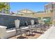 Chic outdoor lounge area featuring contemporary seating, water features, and lush landscaping at 450 Knights Run Ave # 407, Tampa, FL 33602
