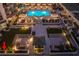 Stunning aerial view of a luxury condo complex showcasing a pool and lush outdoor lounge area at 450 Knights Run Ave # 407, Tampa, FL 33602