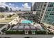 Relaxing pool and lounge area provides a resort-style retreat for condo residents with city view at 450 Knights Run Ave # 407, Tampa, FL 33602