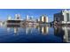 The beautiful Tampa skyline reflecting on the water, displaying iconic buildings against a blue sky at 450 Knights Run Ave # 407, Tampa, FL 33602